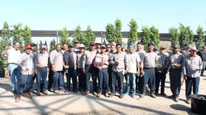Garden View landscape maintenance crews posing with Awards